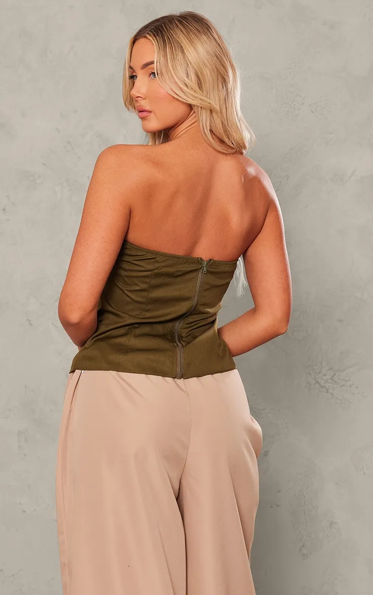 Top bustier tissé vert olive à bordures asymétriques